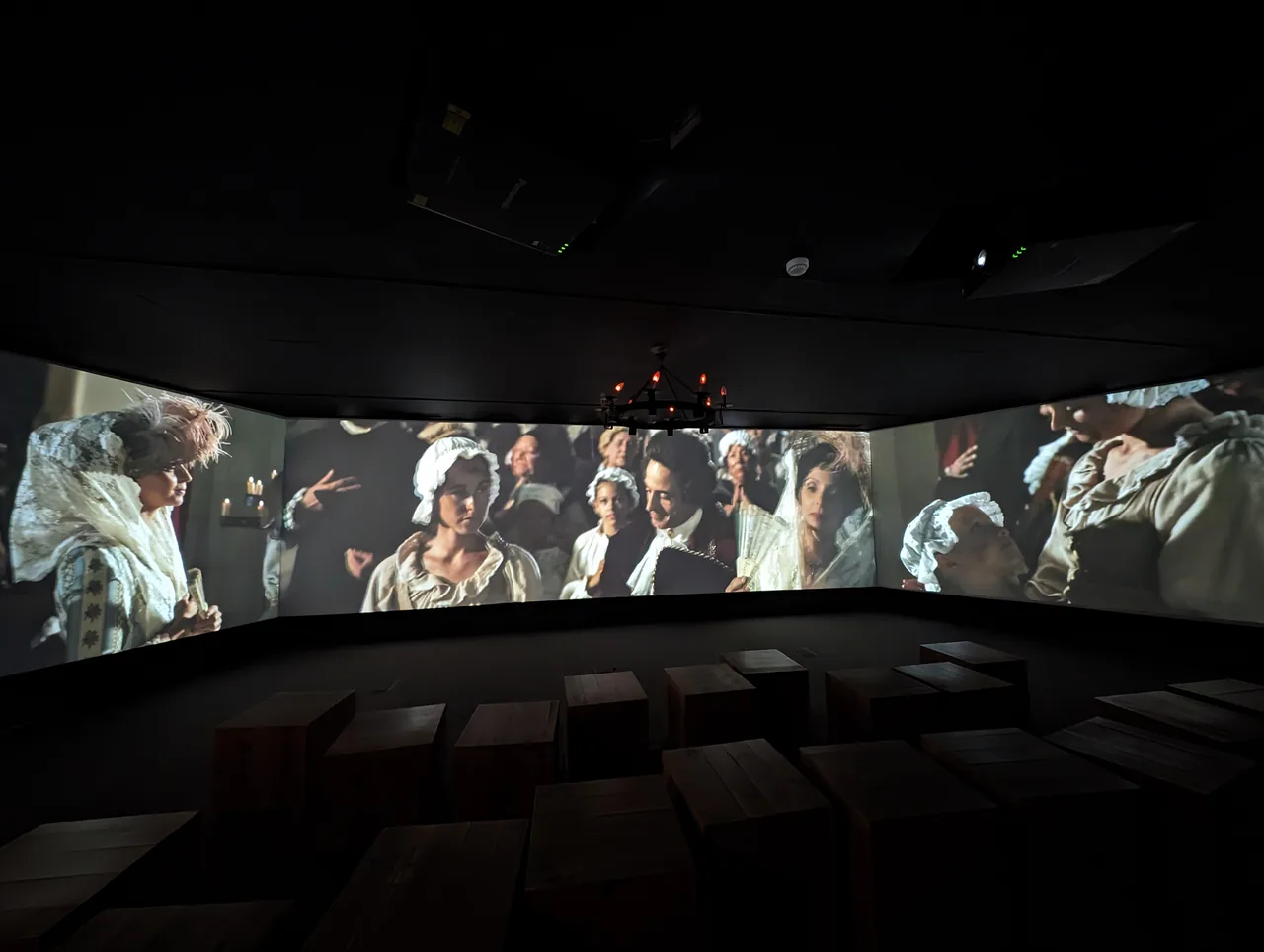 Multiple screens showing the 1755 earthquake presentation at Lisboa Story Centre