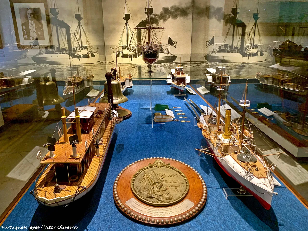 Model vessels and nautical objects in a gallery at Lisbon’s Maritime Museum.