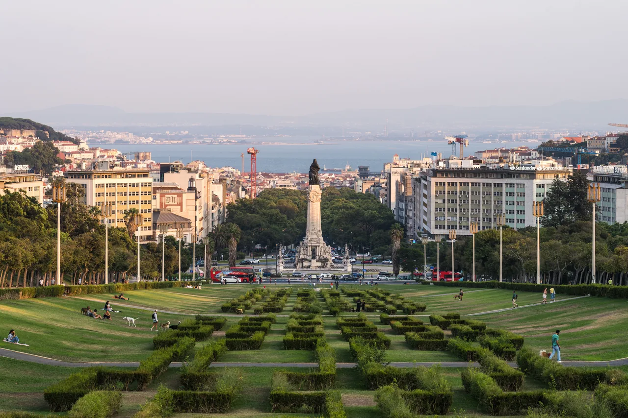 Formal hedges in Parque Eduardo VII with central Lisbon and the Tagus in the distance